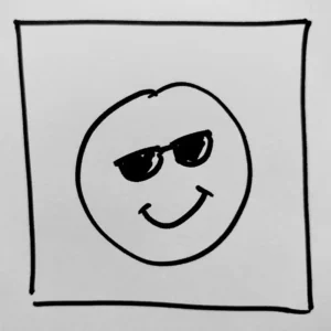 A hand-drawn smiley face, wearing sunglasses